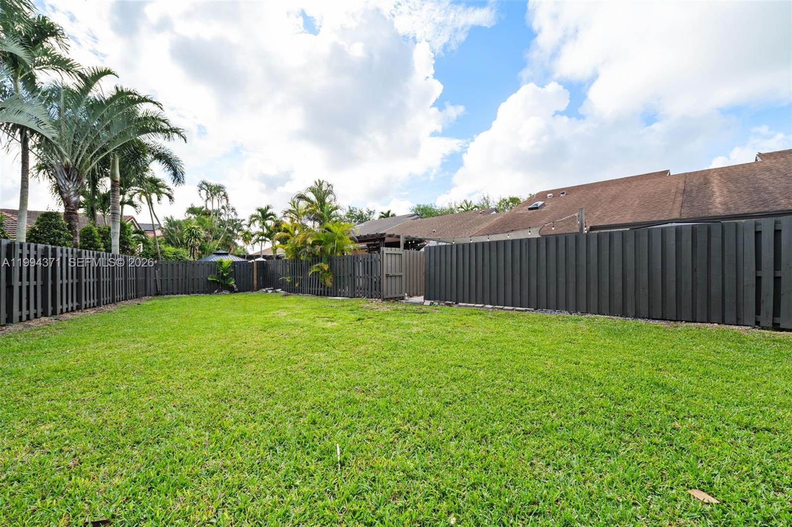 11758 Southwest 92nd Terrace Miami, FL 33186 - Photo 23 of 30 a view of a backyard with a garden