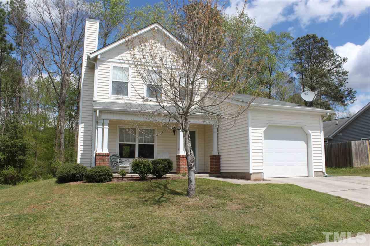 4001 Hopper Street Raleigh, NC 27616 - Photo 3 of 25 a view of a house with backyard and garden