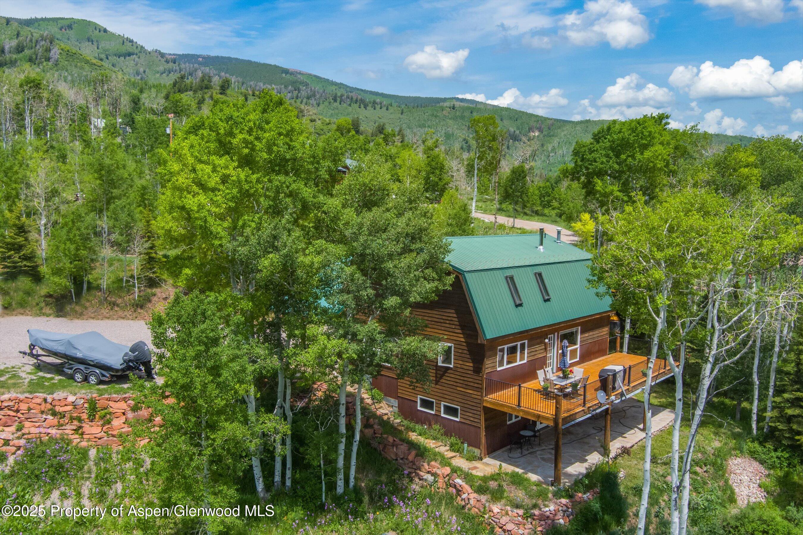 238 Hawk Lane Basalt, CO 81621 - Photo 4 of 46 an aerial view of a house with a yard