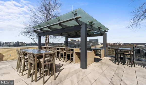 a view of a dinning tables and chairs in the patio