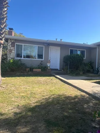a view of a house with a swimming pool