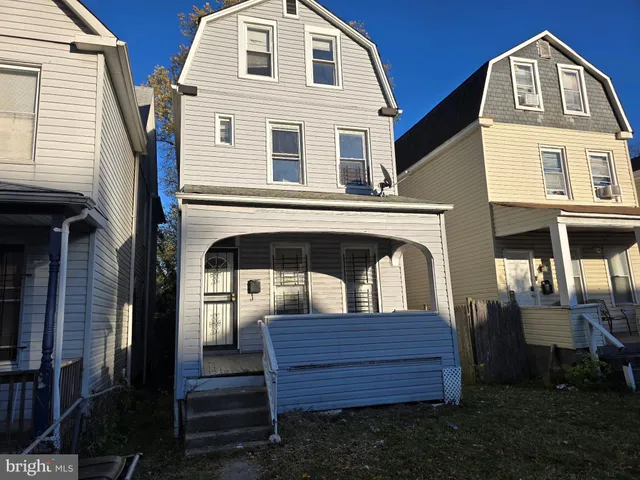 a front view of a house with a balcony