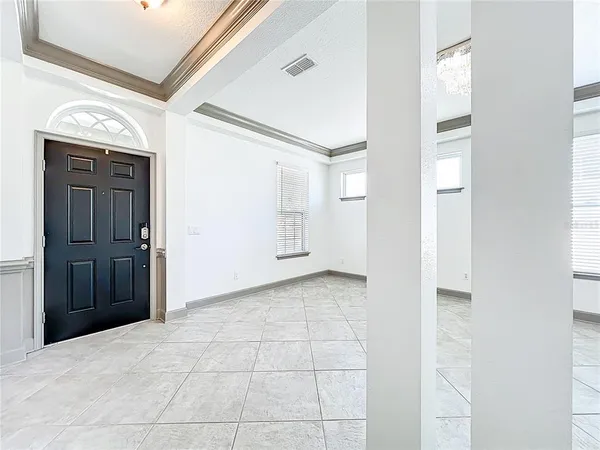 a kitchen with stainless steel appliances granite countertop a refrigerator a sink dishwasher a oven and a oven with wooden cabinets