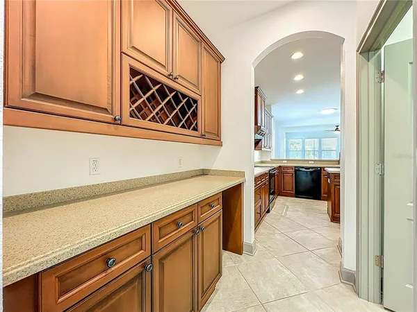 a view of empty room with a fireplace