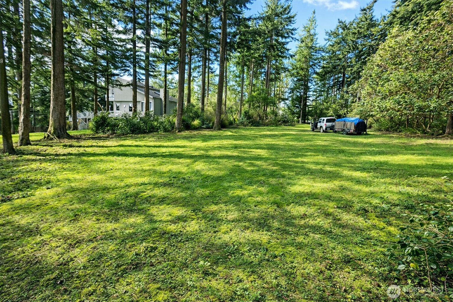 1012 North Scenic Heights Road Oak Harbor, WA 98277 - Photo 10 of 25 a garden view with a trees