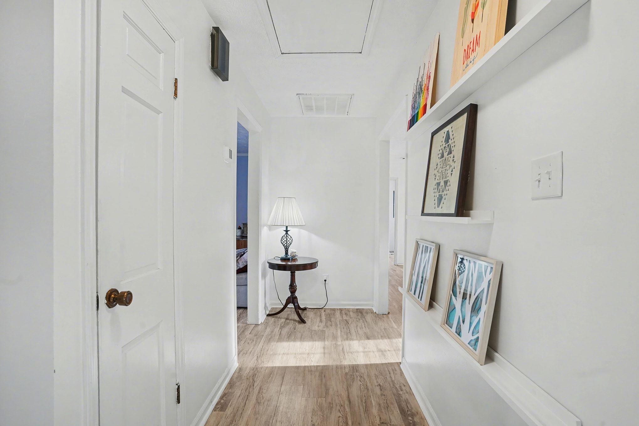 317 Jay Street Murrells Inlet, SC 29576 - Photo 14 of 36 Hall with light wood-type flooring and baseboards