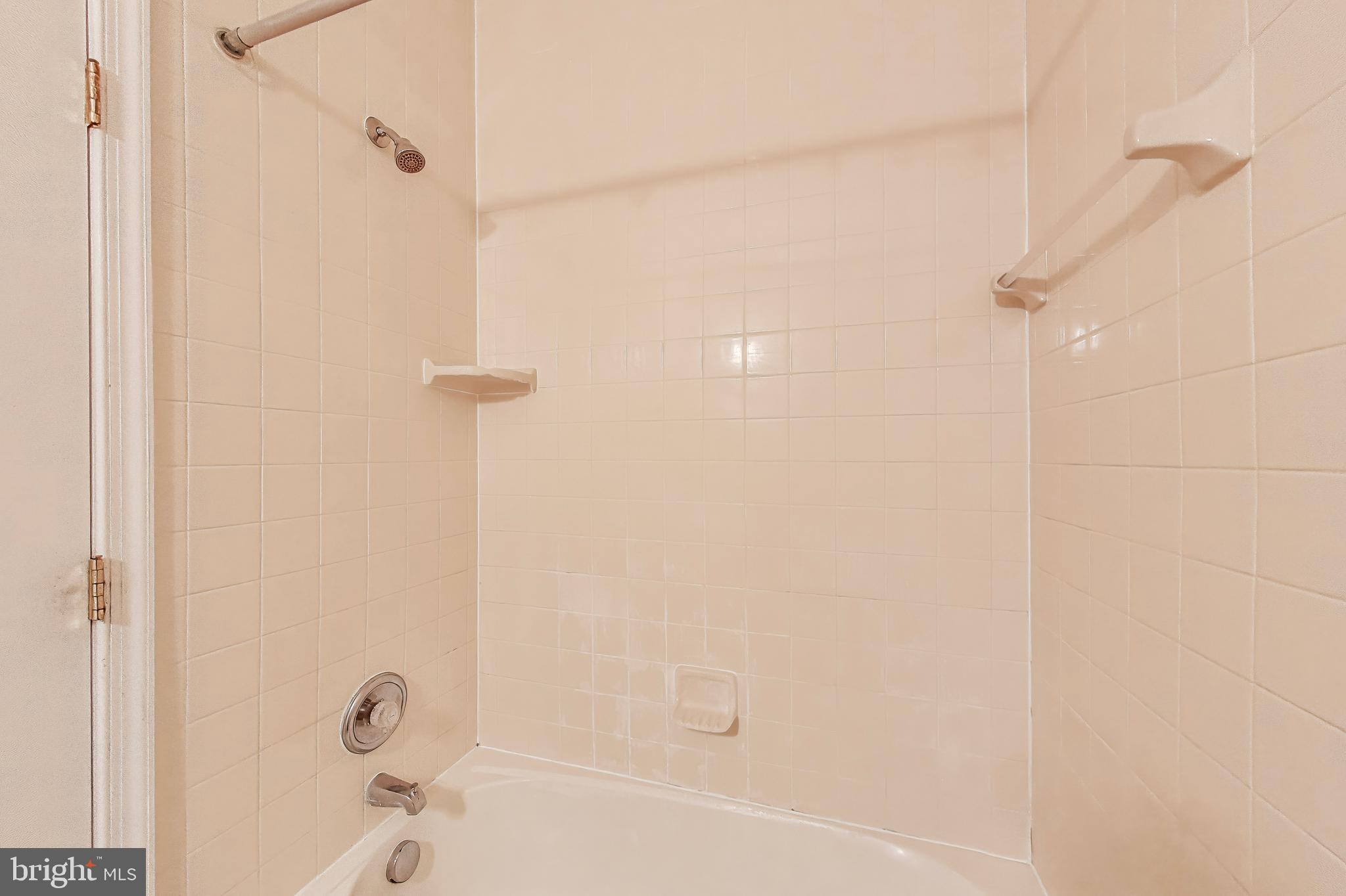 138 Danbury Street Southwest Washington, DC 20032 - Photo 22 of 32 a bathroom with a bathtub