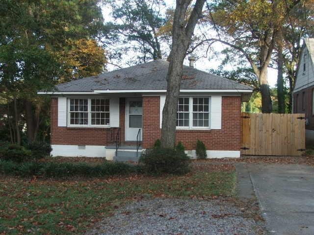 2456 Perkerson Road Southwest Atlanta, GA 30315 - Photo 1 of 1 a front view of a house with garden