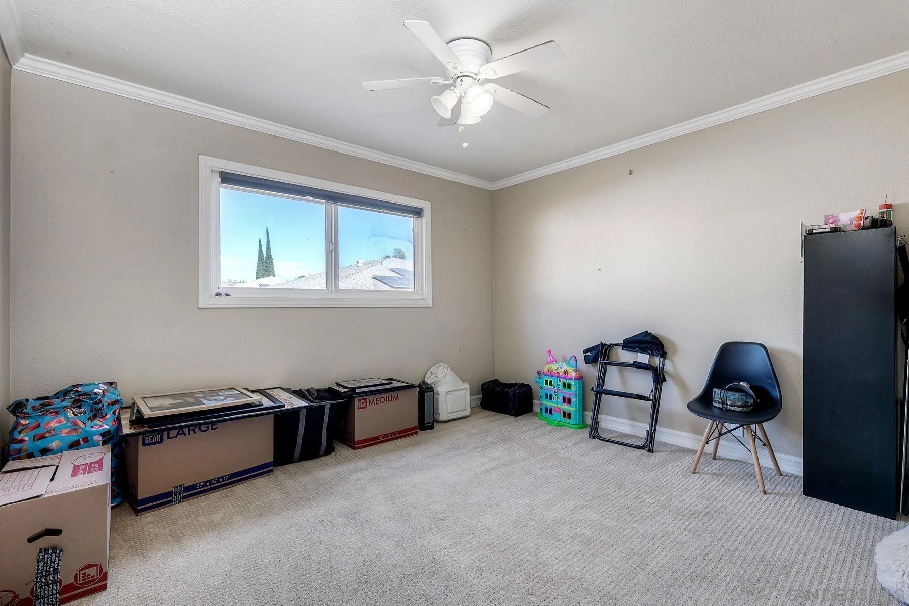 12923 Mapleview Street, Unit 6 Lakeside, CA 92040 - Photo 22 of 25 a bed room with furniture and a window