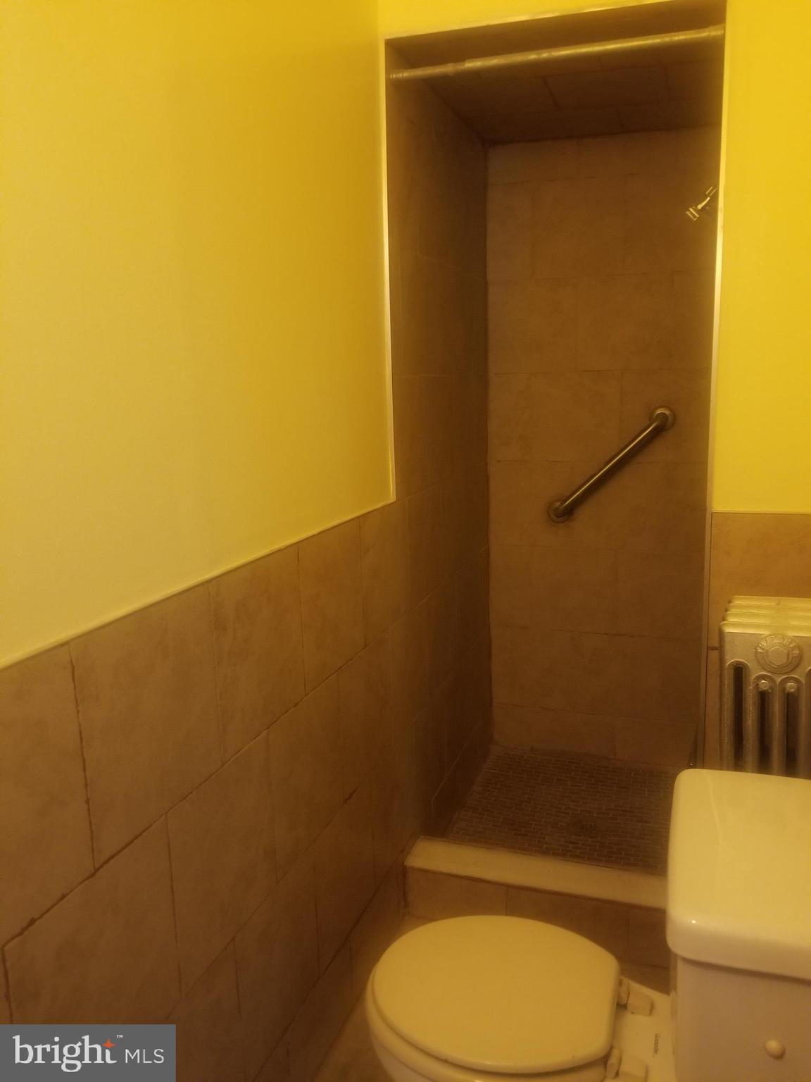 226 Copley Road Upper Darby, PA 19082 - Photo 10 of 10 a bathroom with a toilet and a sink