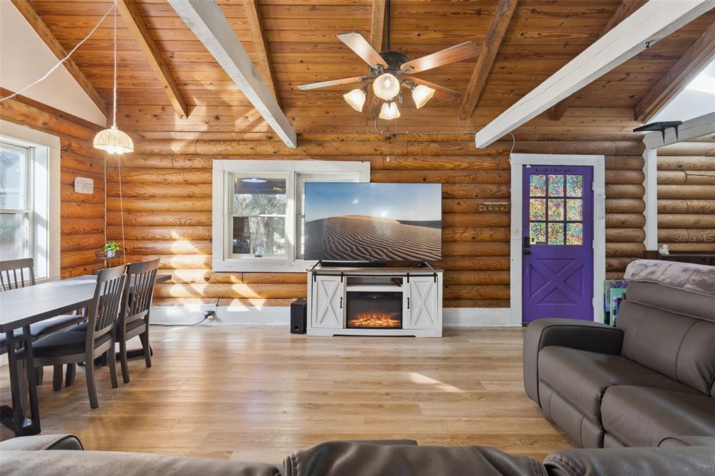 1208 D Arcy Road Lady Lake, FL 32159 - Photo 15 of 50 a living room with furniture and a flat screen tv
