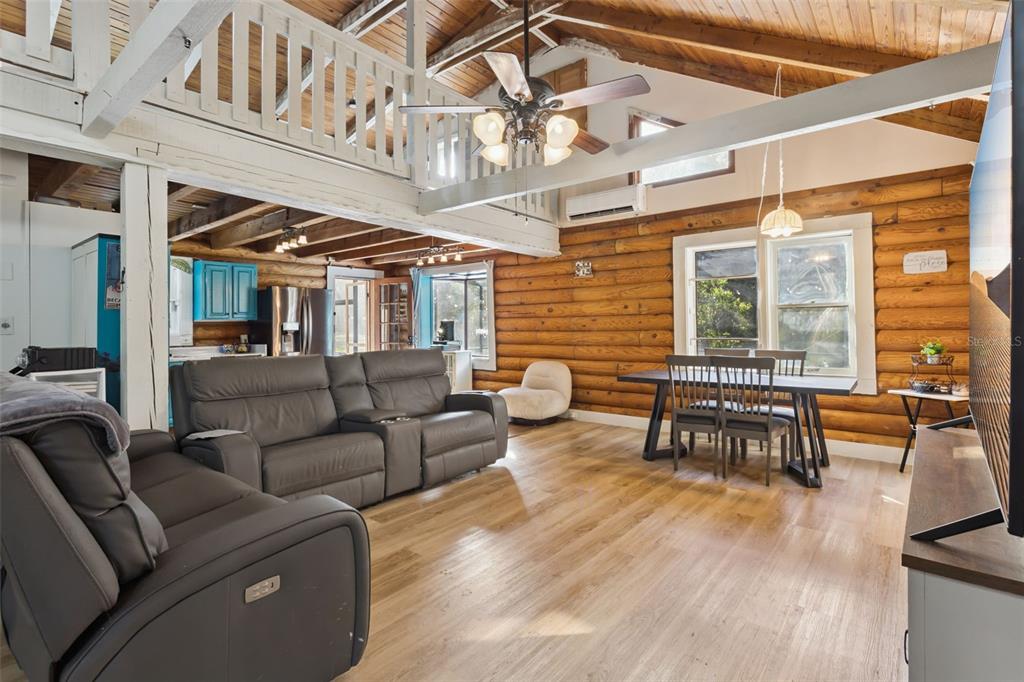1208 D Arcy Road Lady Lake, FL 32159 - Photo 8 of 50 a living room with furniture and wooden floor