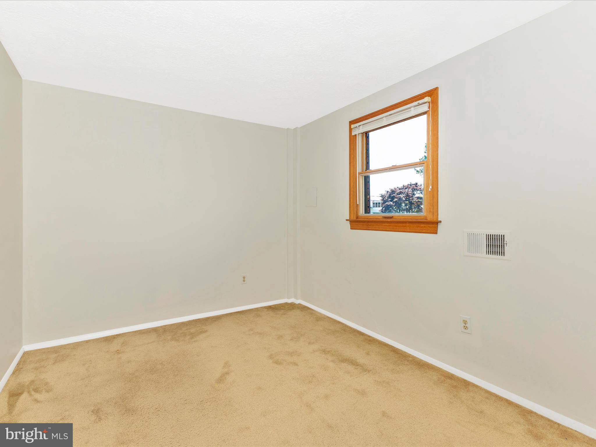 8344 Capel Drive Pasadena, MD 21122 - Photo 24 of 30 an empty room with a window