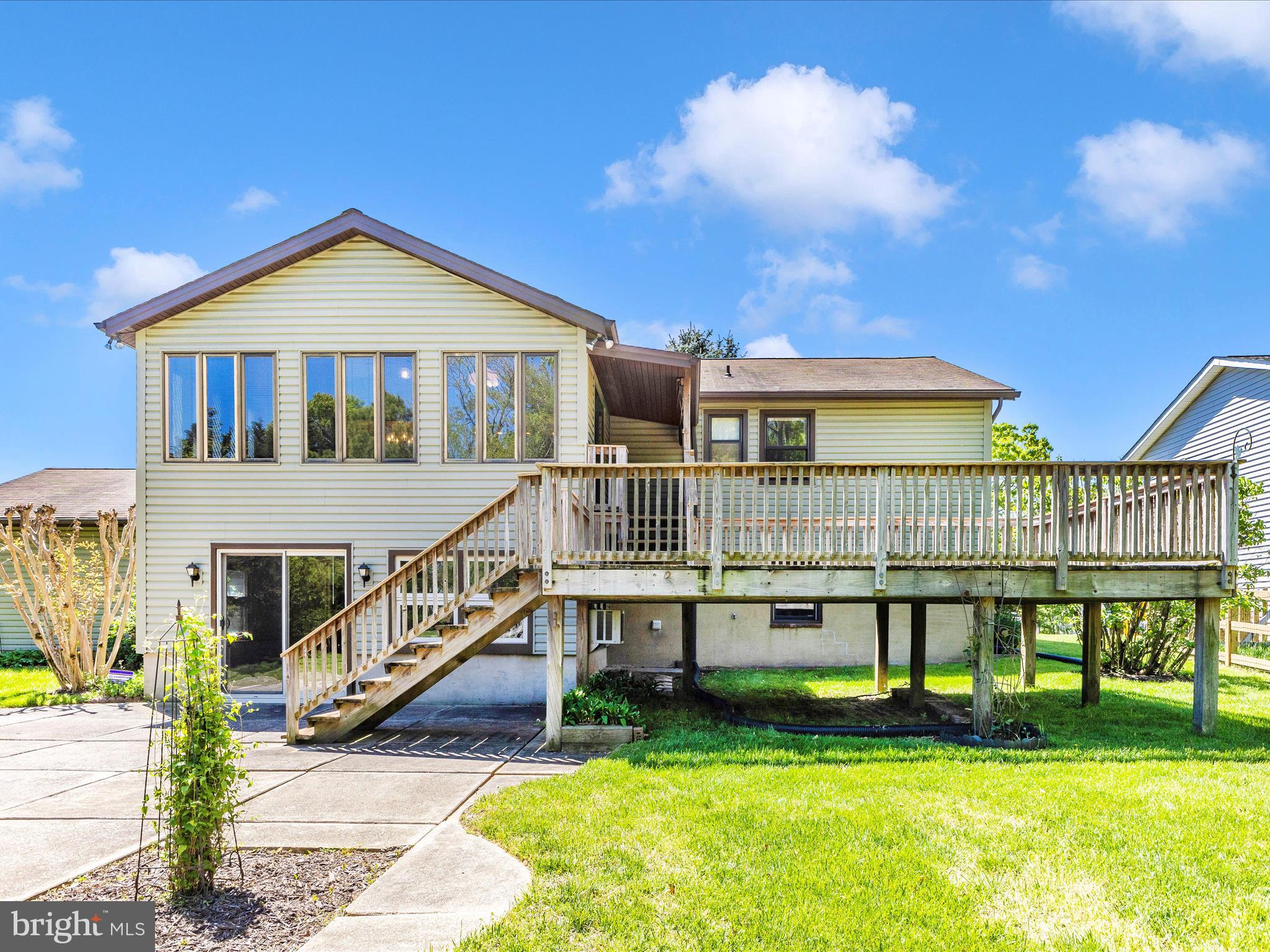 8344 Capel Drive Pasadena, MD 21122 - Photo 5 of 30 a view of a house with a yard