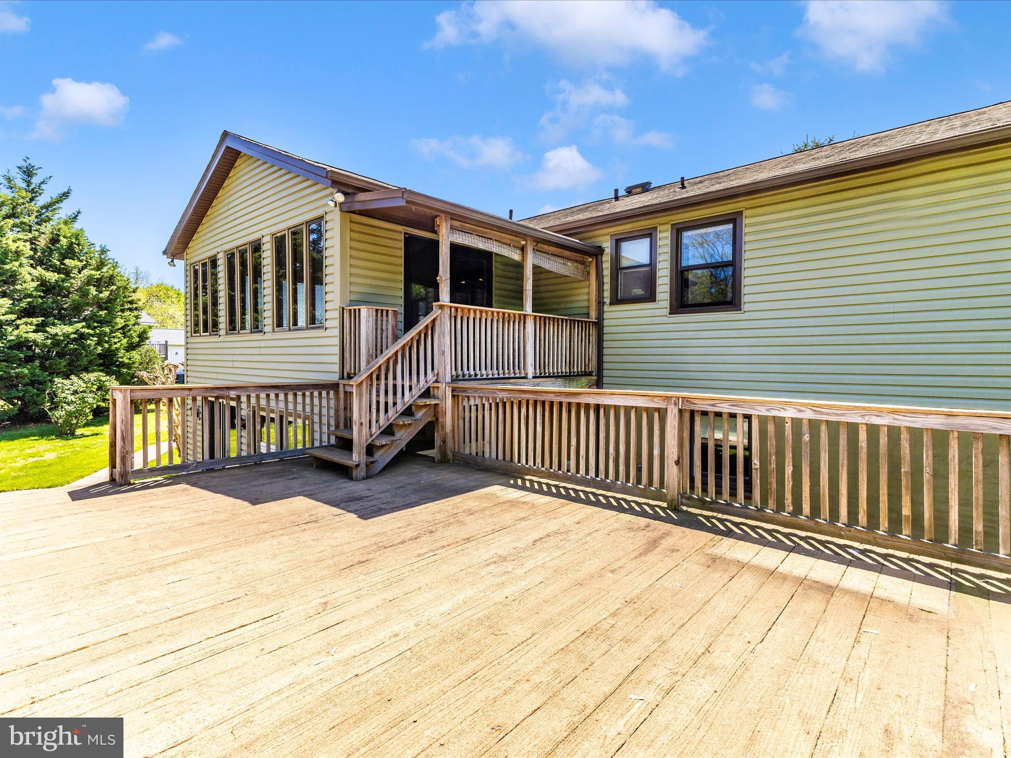 8344 Capel Drive Pasadena, MD 21122 - Photo 6 of 30 a view of a house with swimming pool and sitting area