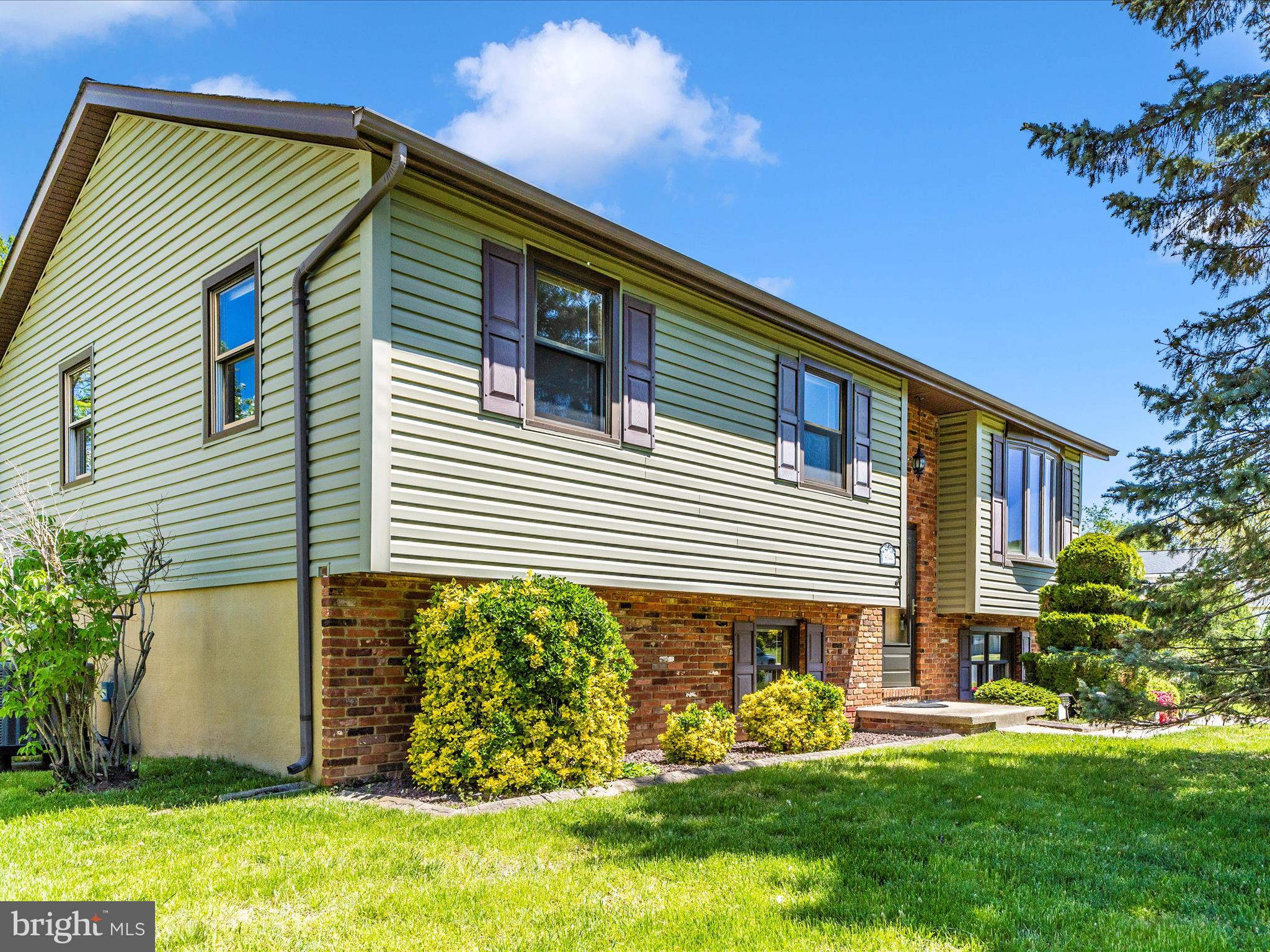 8344 Capel Drive Pasadena, MD 21122 - Photo 8 of 30 a front view of a house with garden