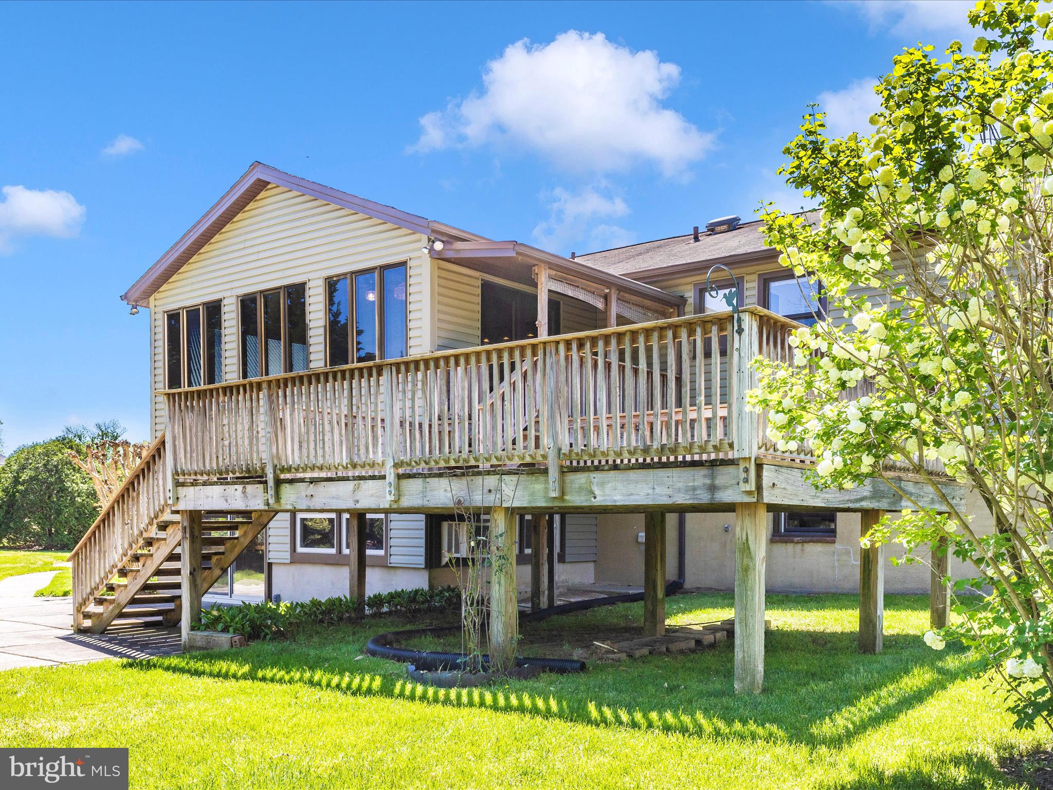 8344 Capel Drive Pasadena, MD 21122 - Photo 9 of 30 a view of a house with backyard porch and sitting area