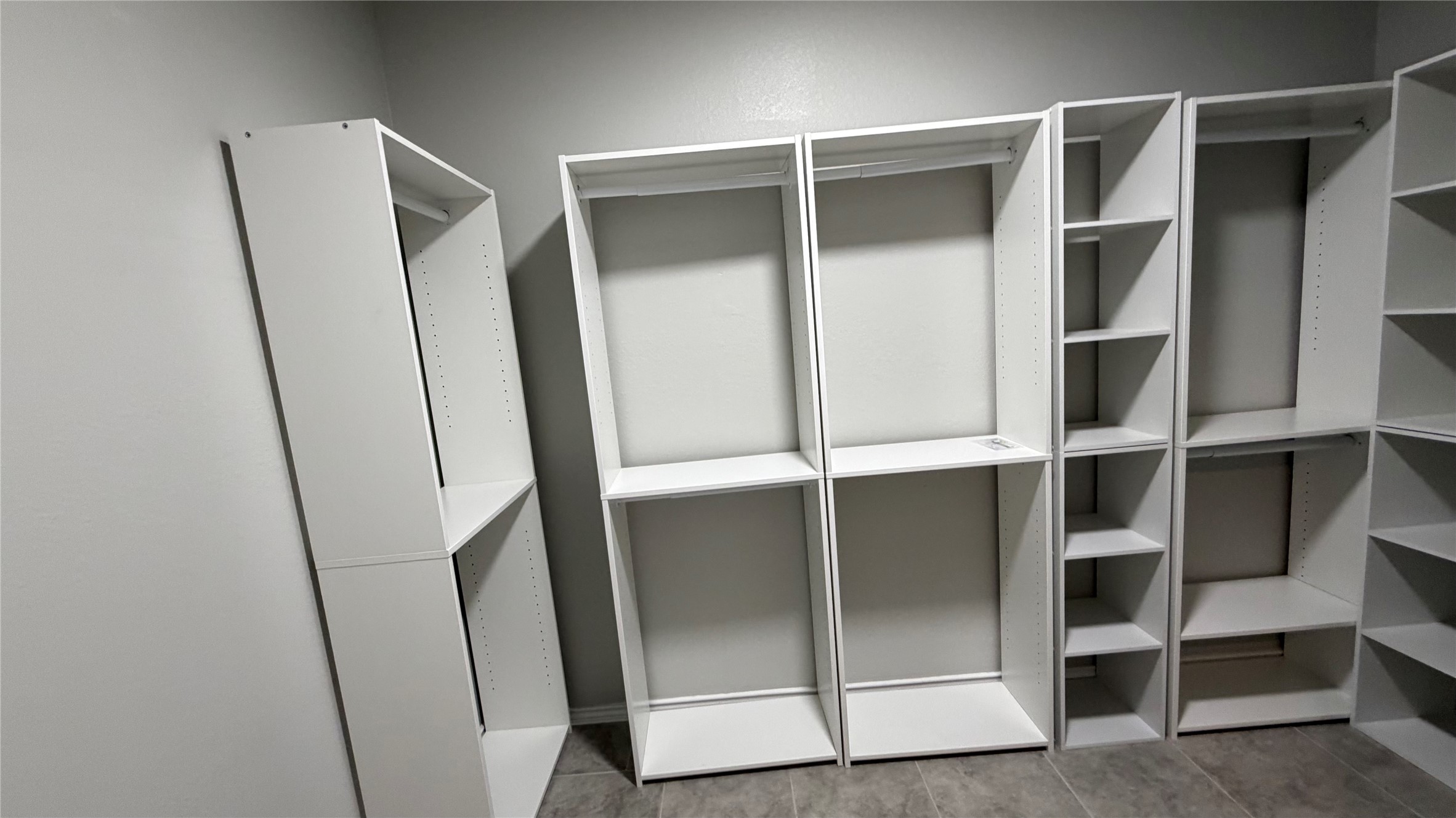 7518 Cynomys Court Rosharon, TX 77583 - Photo 17 of 21 a view of closet with empty racks