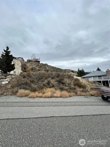 a view of ocean with mountain