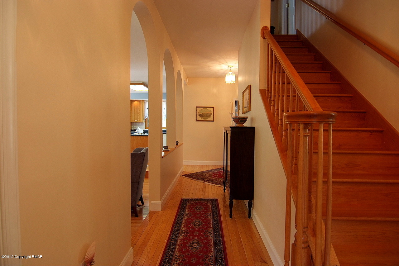 6726 Cherry Valley Road Stroudsburg, PA 18360 - Photo 42 of 75 Passageway to Kitchen & Stairs to 2nd Fl