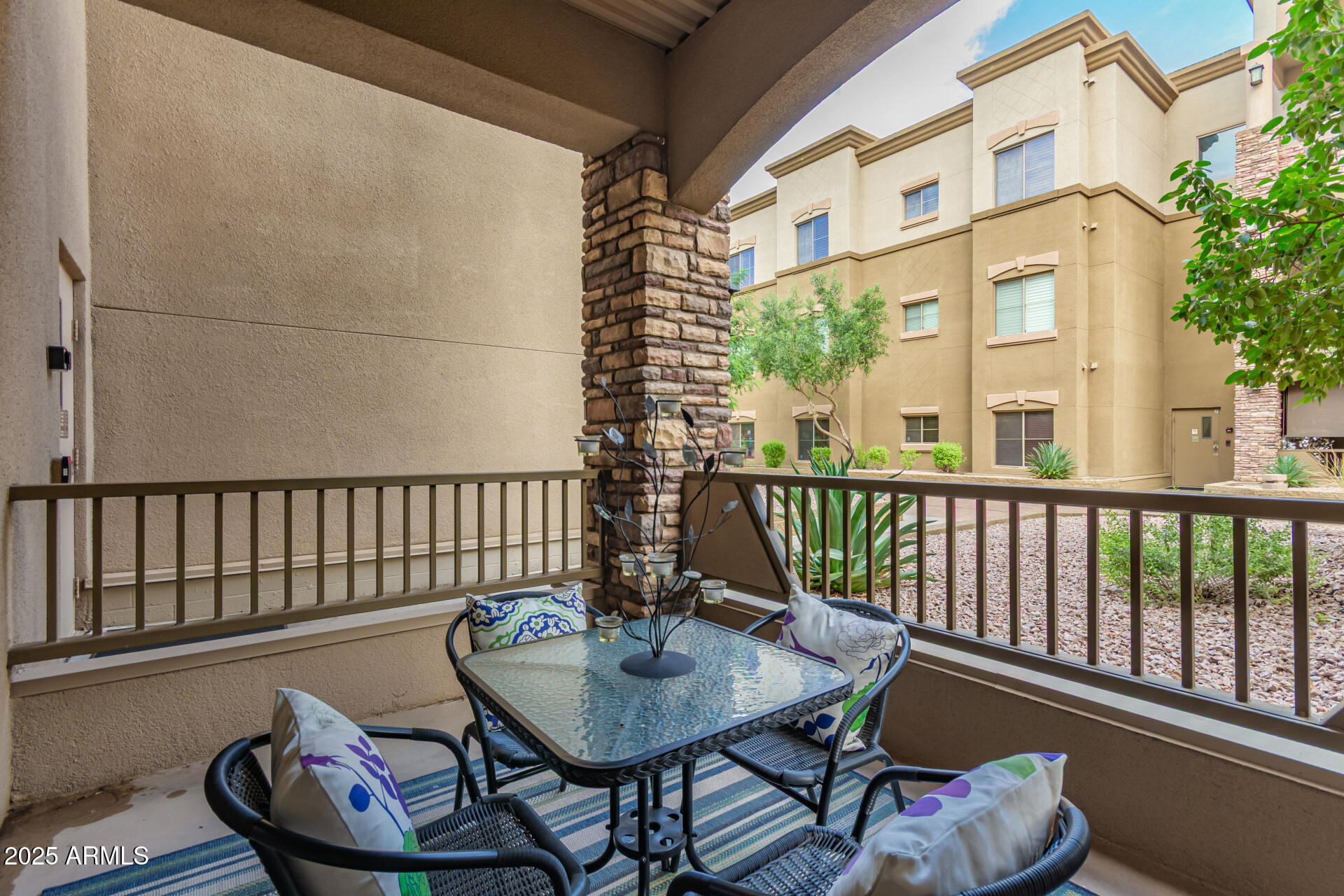 5350 East Deer Valley Drive, Unit 1259 Phoenix, AZ 85054 - Photo 18 of 35 a balcony view with a seating space