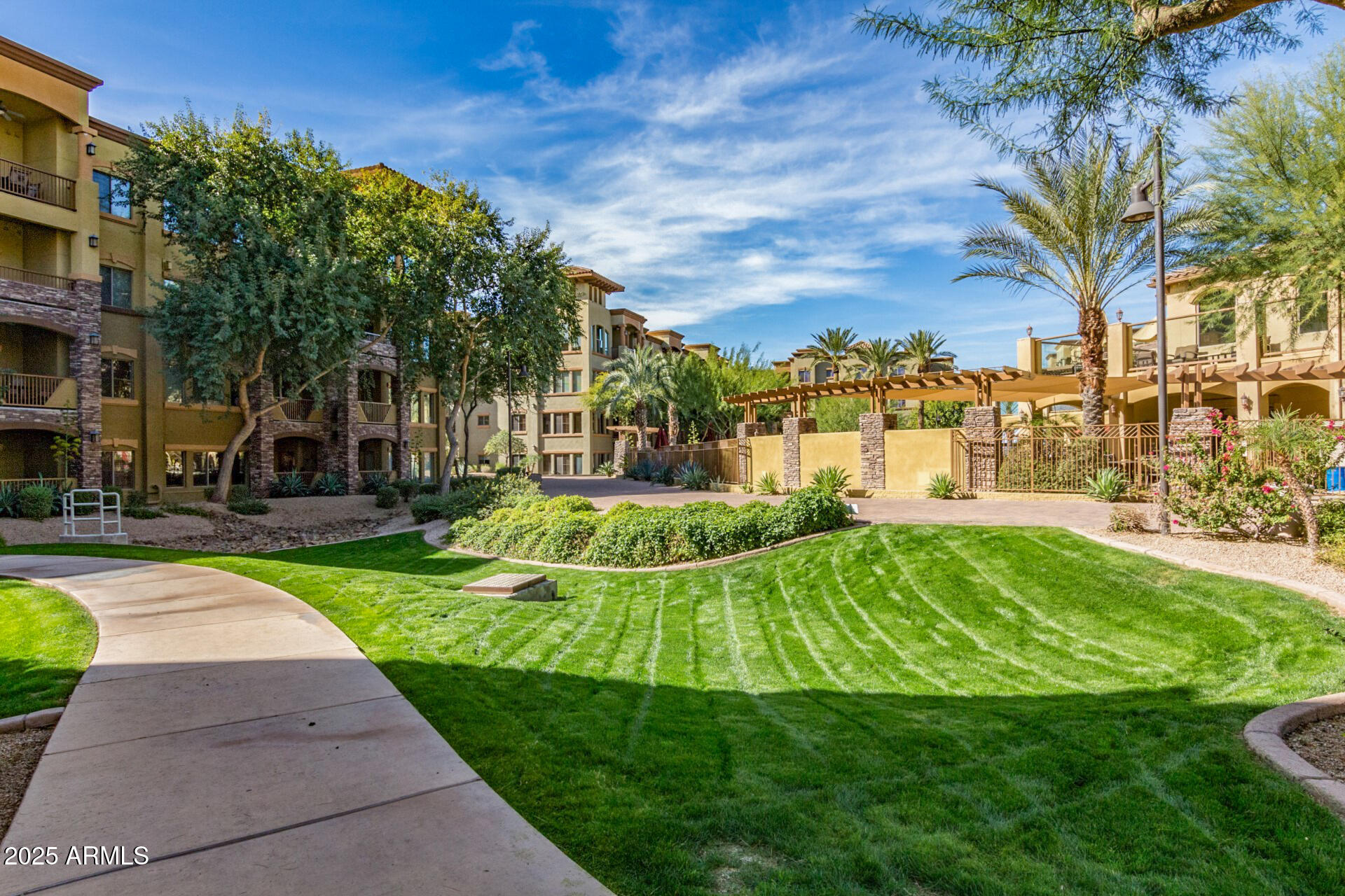 5350 East Deer Valley Drive, Unit 1259 Phoenix, AZ 85054 - Photo 19 of 35 a view of a backyard with a garden