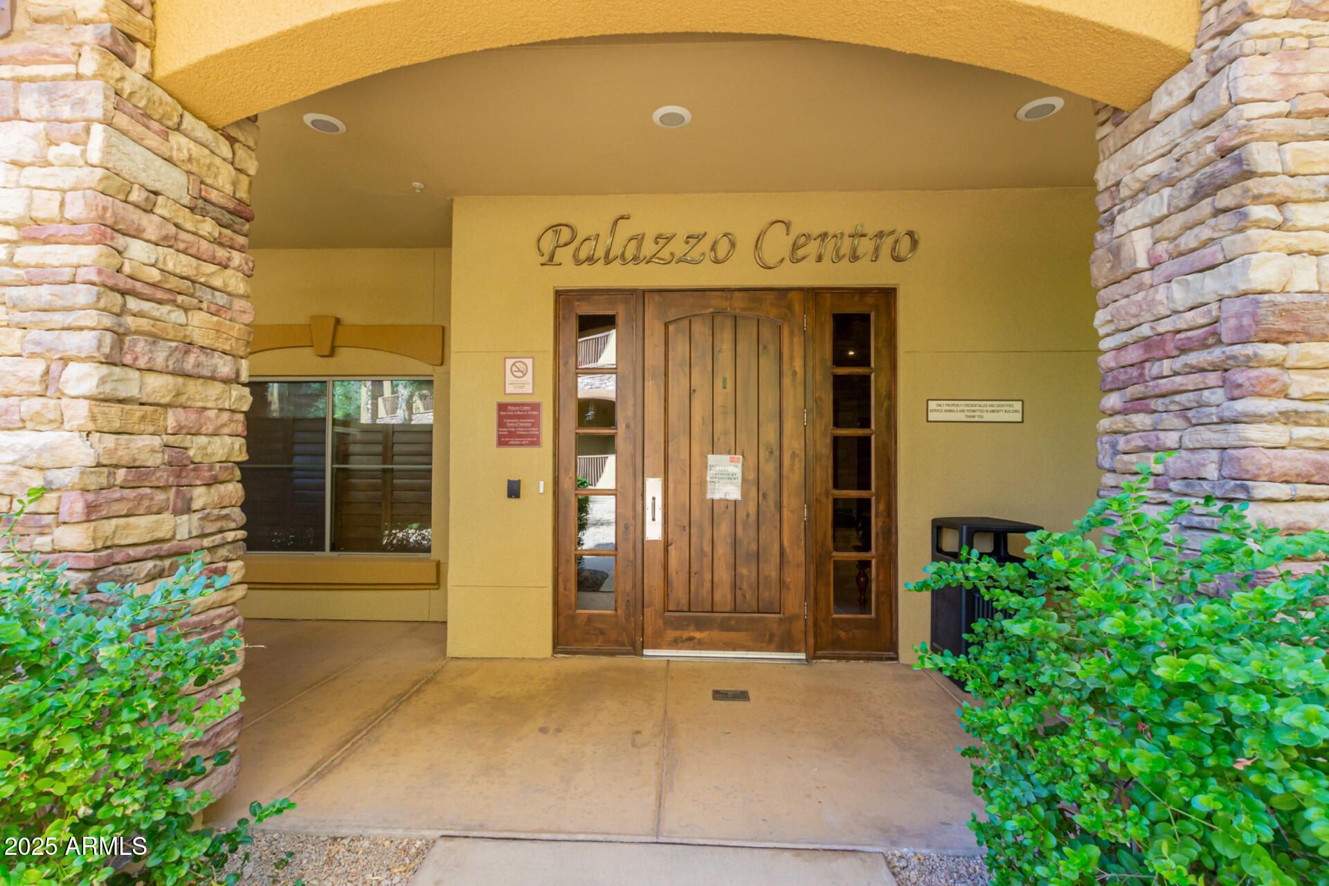 5350 East Deer Valley Drive, Unit 1259 Phoenix, AZ 85054 - Photo 29 of 35 a front view of a building with glass door