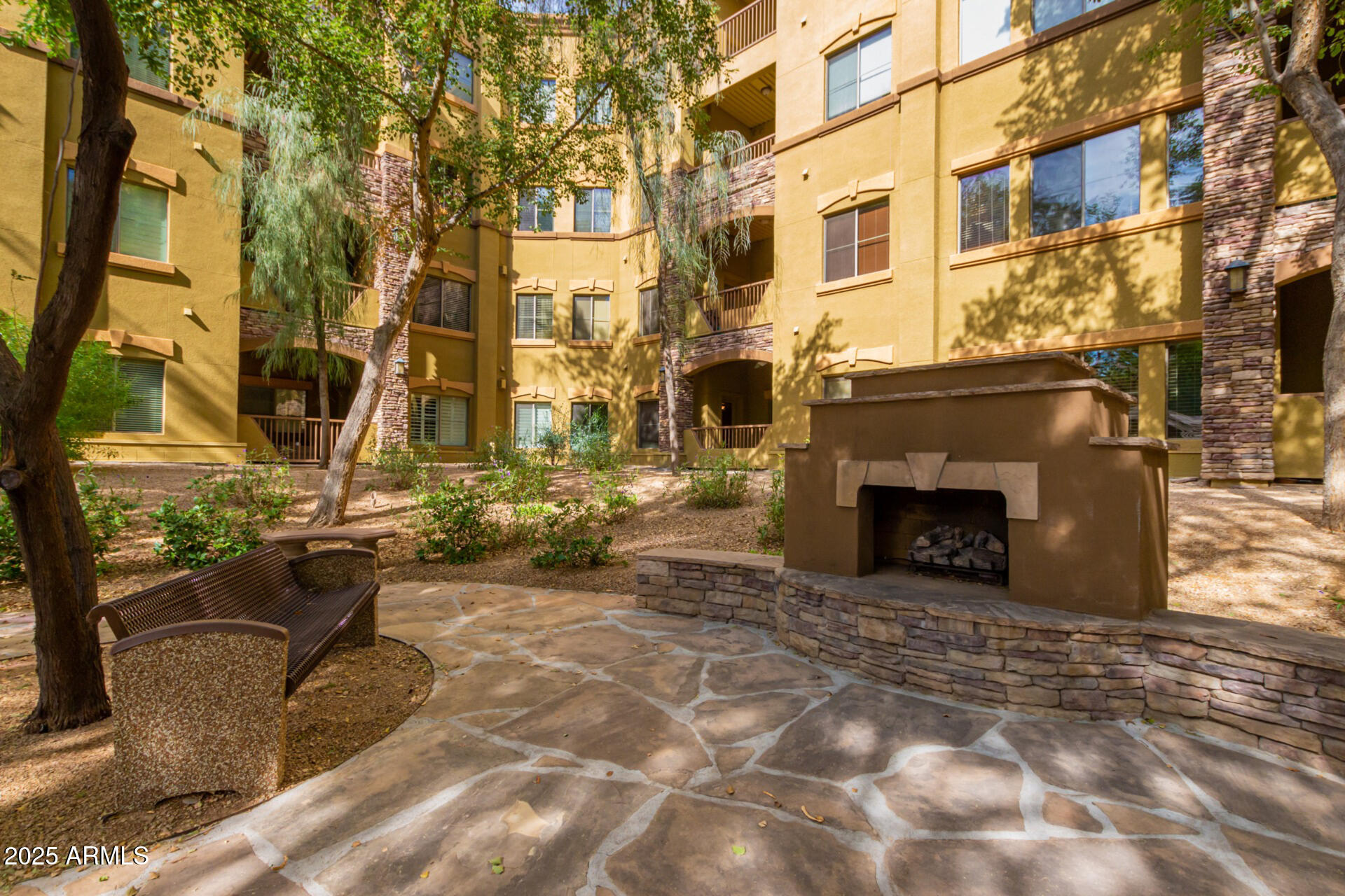 5350 East Deer Valley Drive, Unit 1259 Phoenix, AZ 85054 - Photo 31 of 35 a view of a building with a patio
