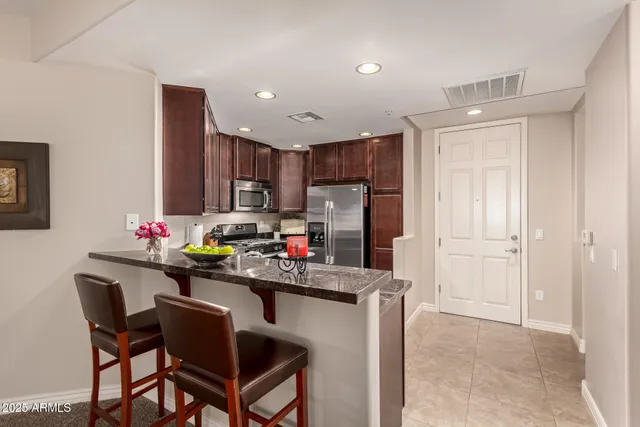 a kitchen that has a cabinets counter space and appliances