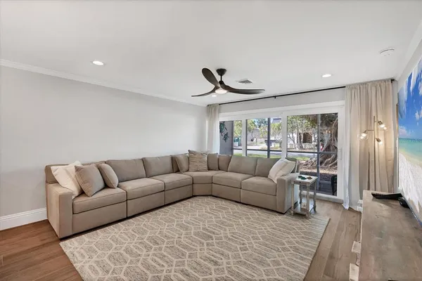 a living room with furniture and a window
