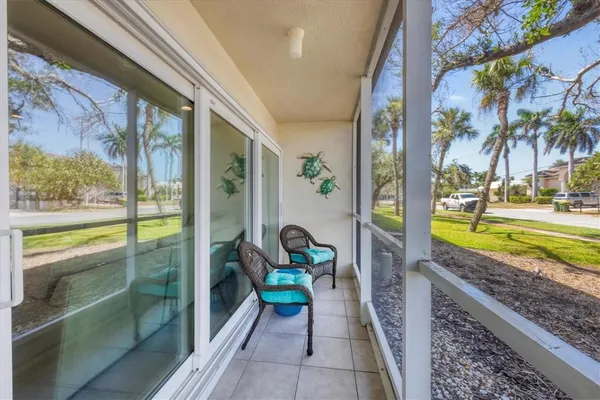 a view of swimming pool with outdoor seating