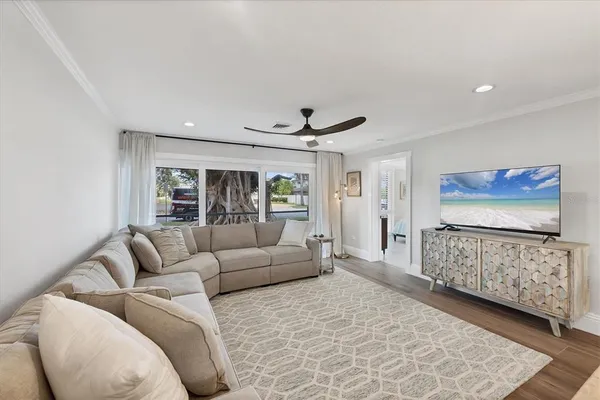 a living room with furniture and window