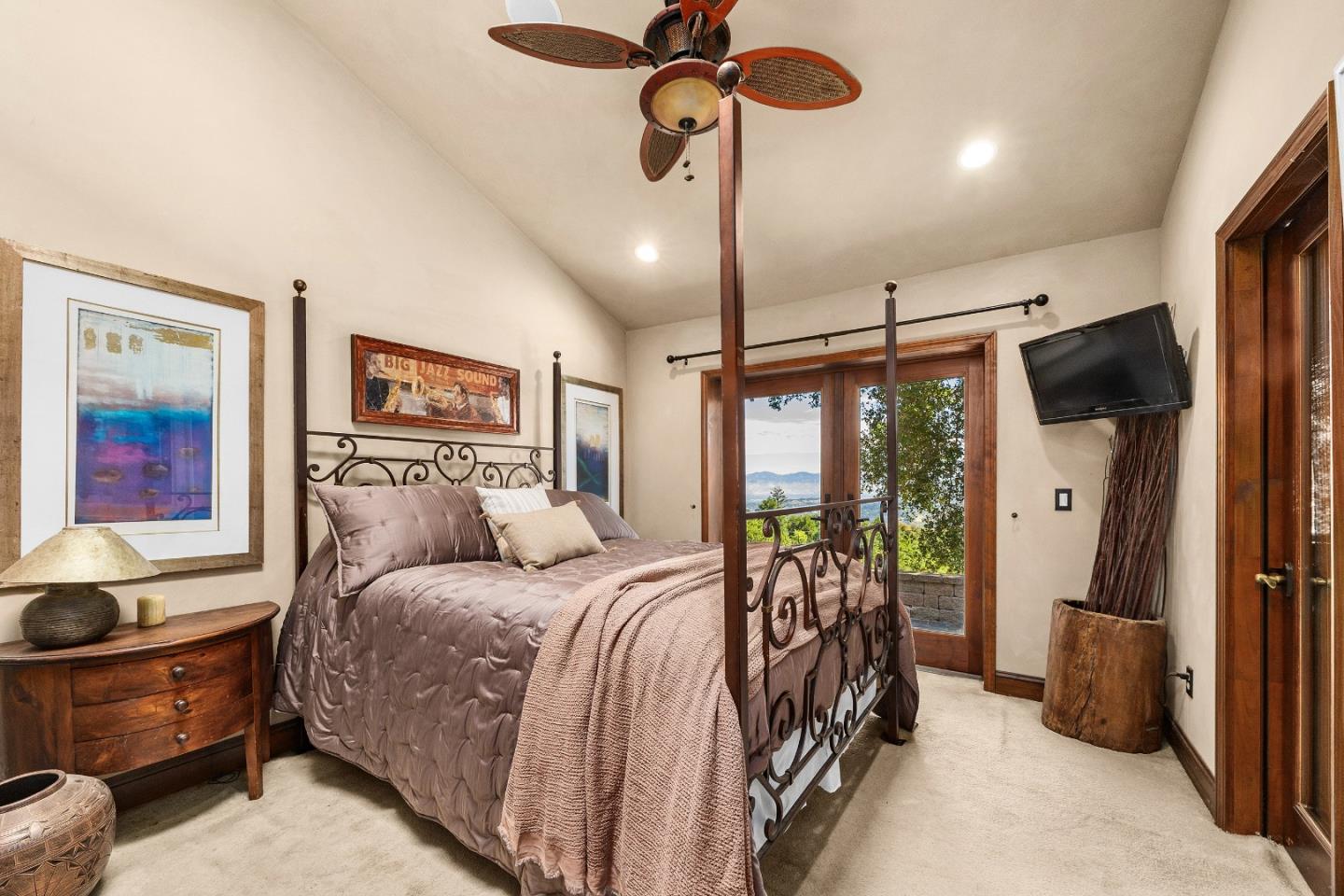 19375 Montevina Road Los Gatos, CA 95033 - Photo 14 of 36 a bedroom with a bed window and flat screen tv