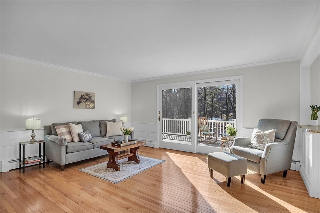 114 Bailey Road Andover, MA 01810 - Photo 15 of 42 a living room with furniture and a wooden floor