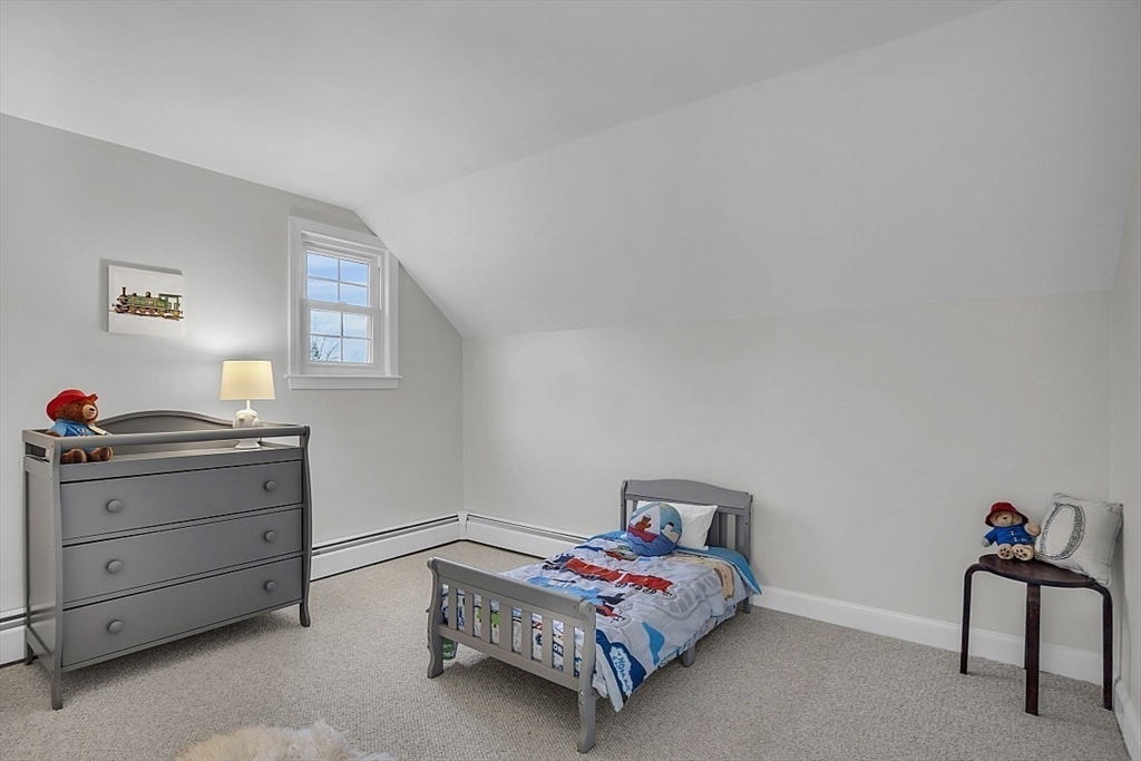 114 Bailey Road Andover, MA 01810 - Photo 23 of 42 a bedroom with a bed and a dresser