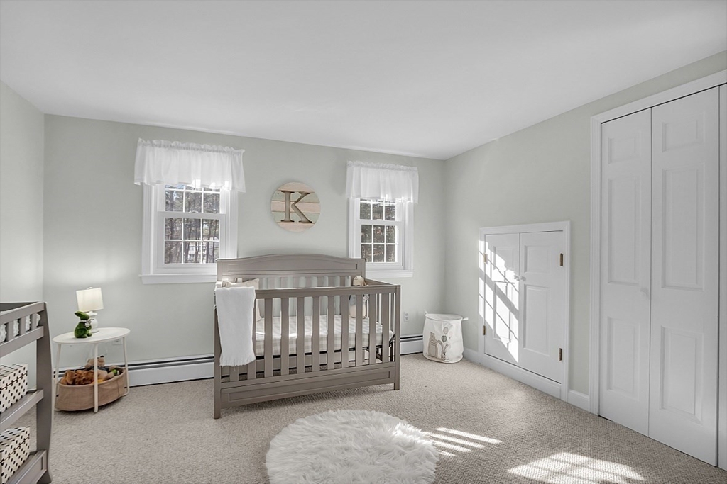 114 Bailey Road Andover, MA 01810 - Photo 25 of 42 a bedroom with furniture and a window