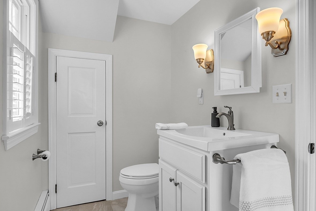 114 Bailey Road Andover, MA 01810 - Photo 29 of 42 a bathroom with a sink toilet and vanity