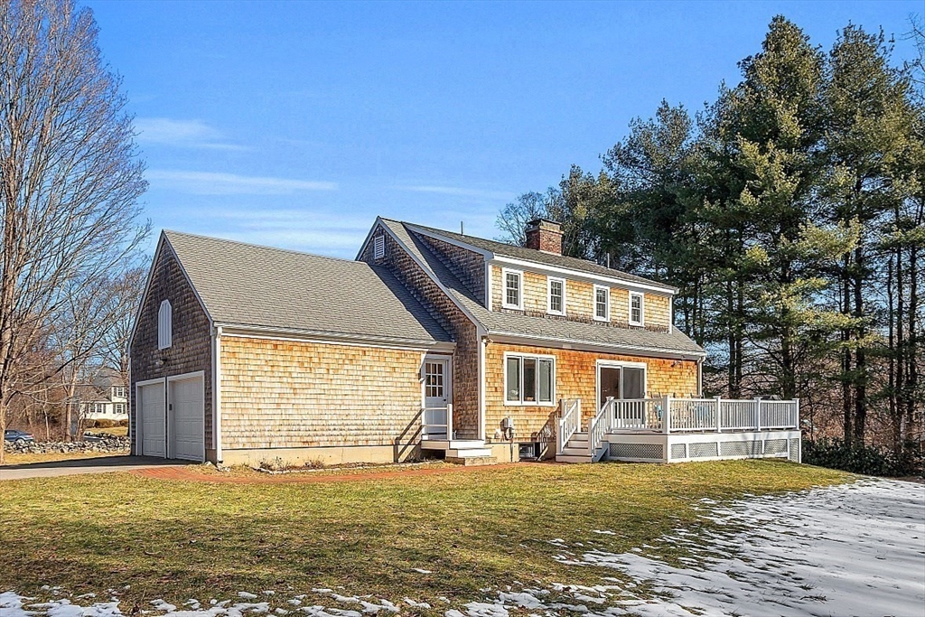 114 Bailey Road Andover, MA 01810 - Photo 41 of 42 a front view of a house with a garden