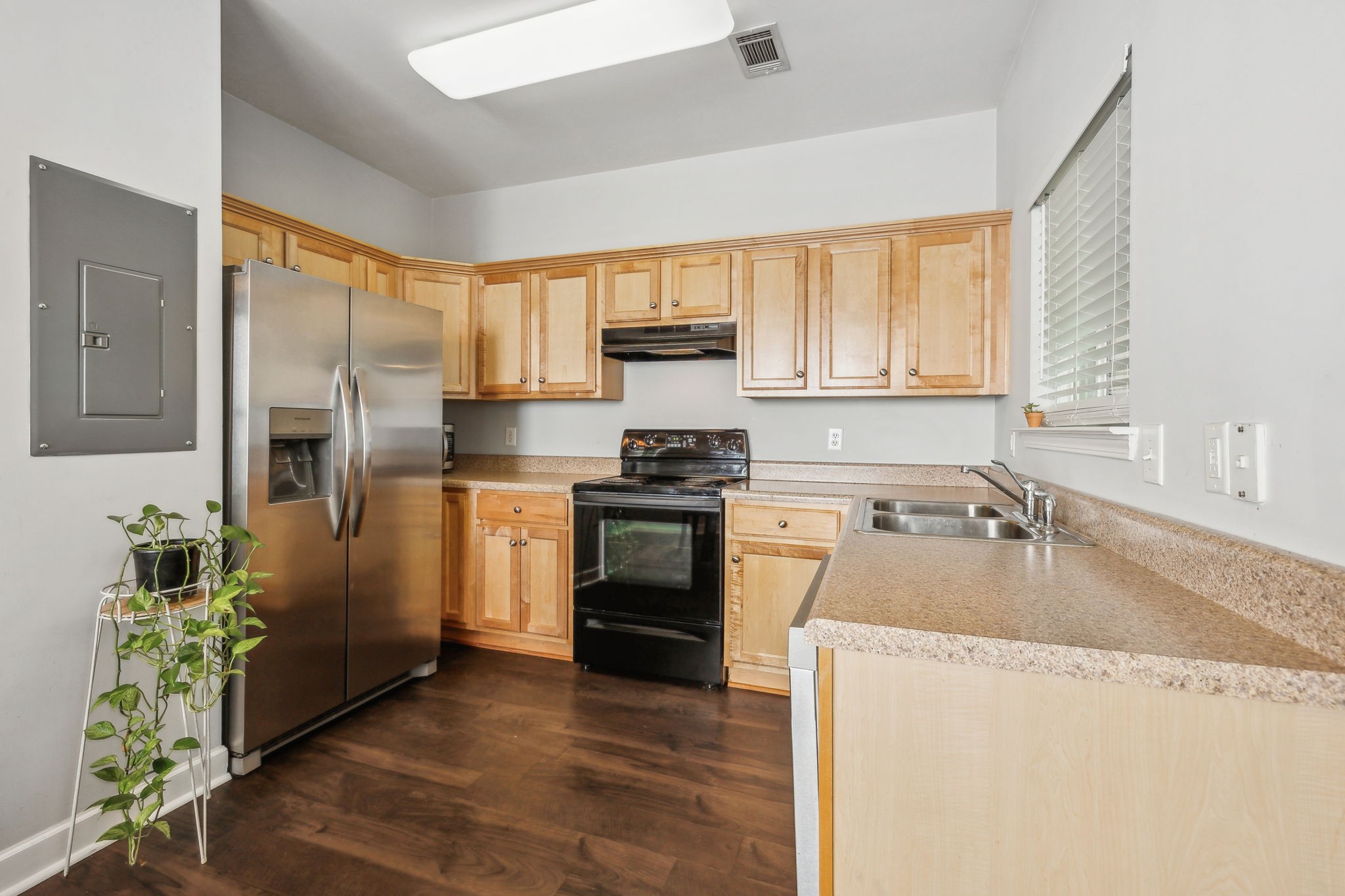 3535 Bell Road, Unit 301 Nashville, TN 37214 - Photo 15 of 47 a kitchen with a refrigerator and a sink