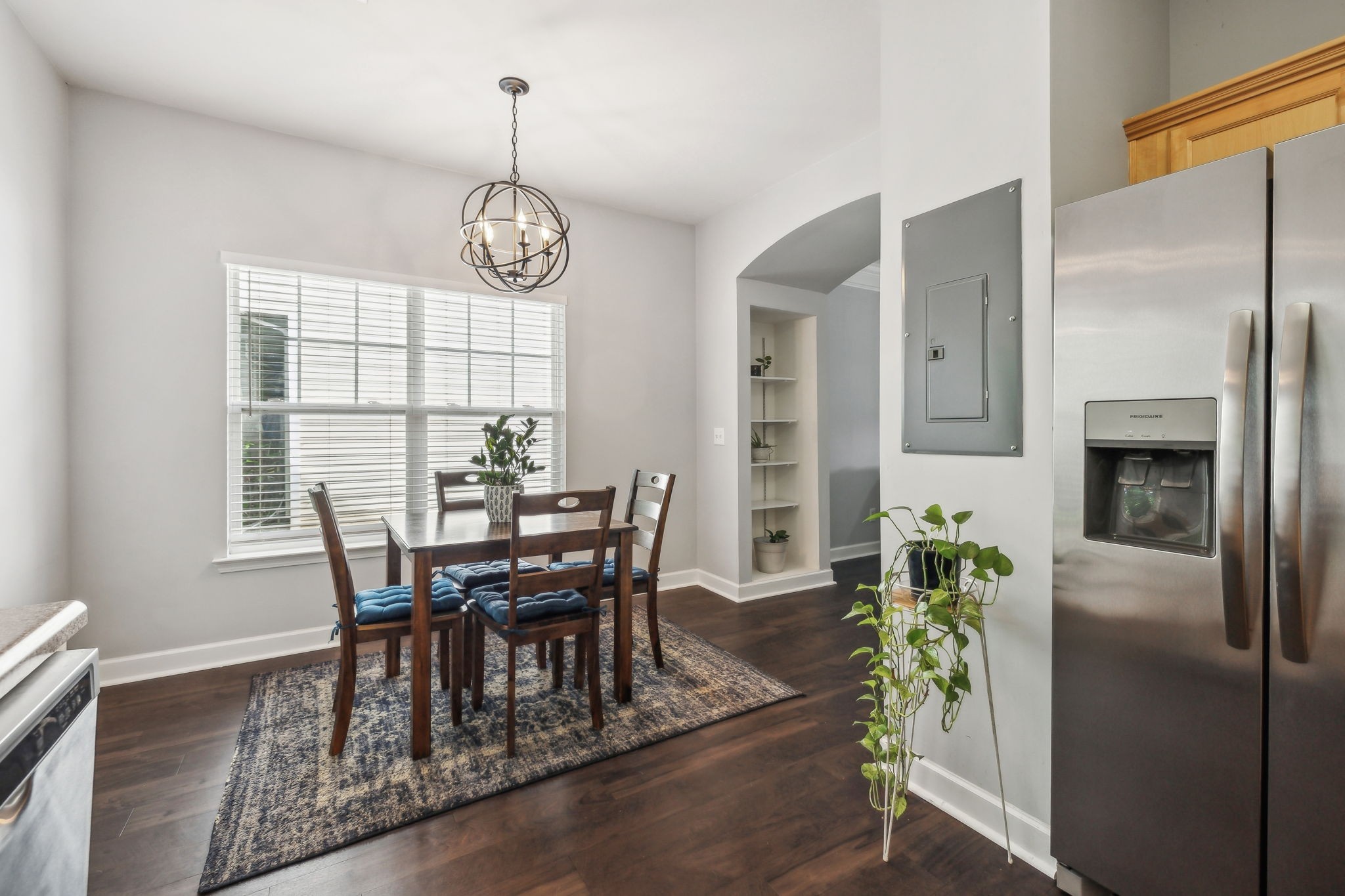 3535 Bell Road, Unit 301 Nashville, TN 37214 - Photo 19 of 47 a view of a dining room with furniture window and wooden floor
