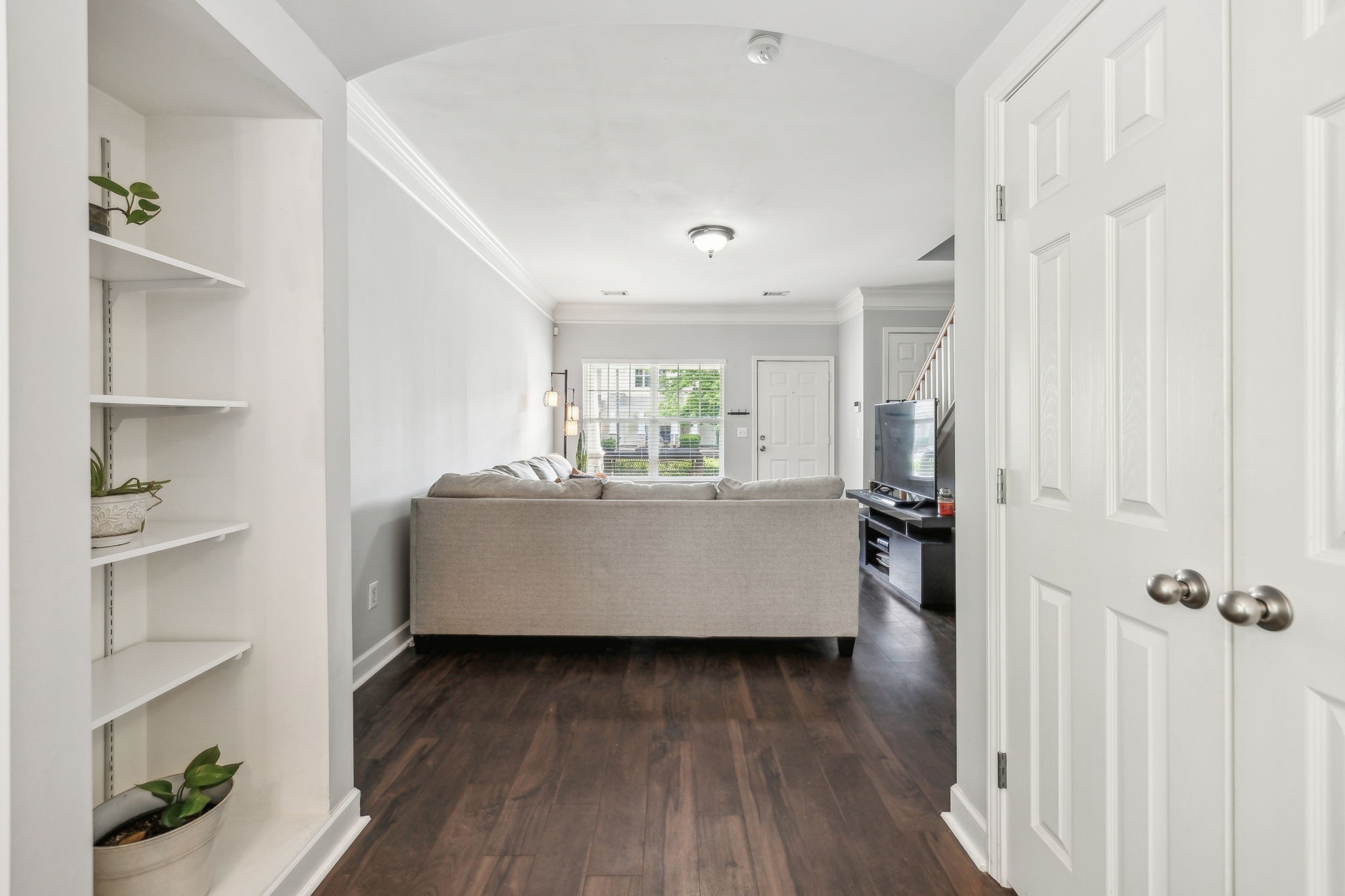 3535 Bell Road, Unit 301 Nashville, TN 37214 - Photo 22 of 47 a living room with furniture and a wooden floor