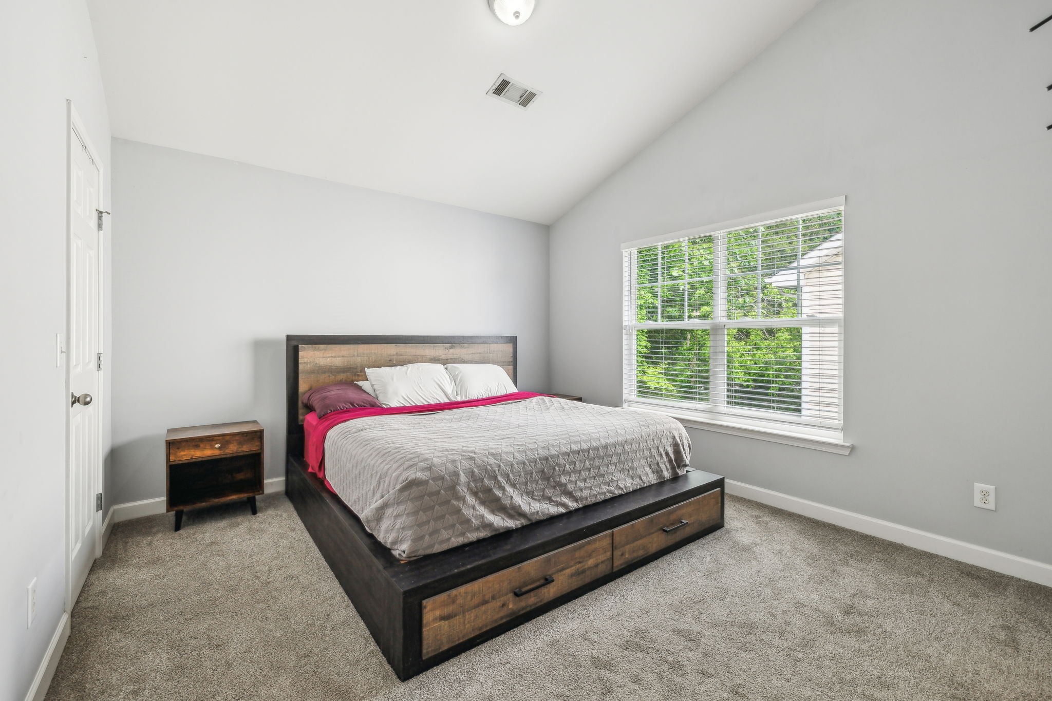 3535 Bell Road, Unit 301 Nashville, TN 37214 - Photo 26 of 47 a bed sitting in a bedroom next to a window