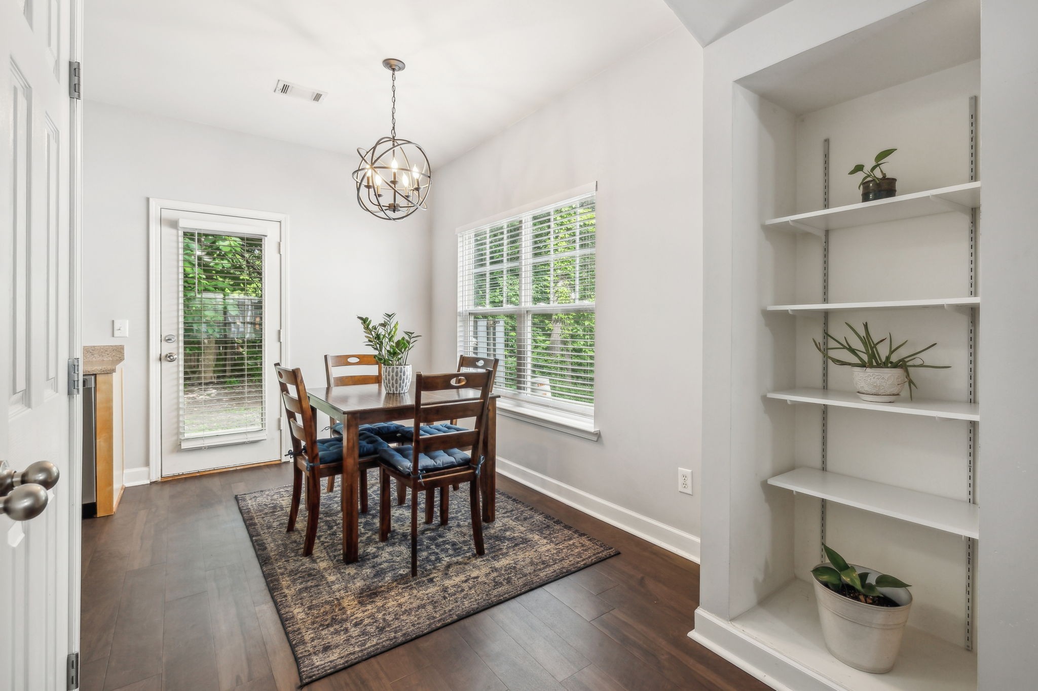 3535 Bell Road, Unit 301 Nashville, TN 37214 - Photo 10 of 47 a view of a dining room with furniture window and wooden floor