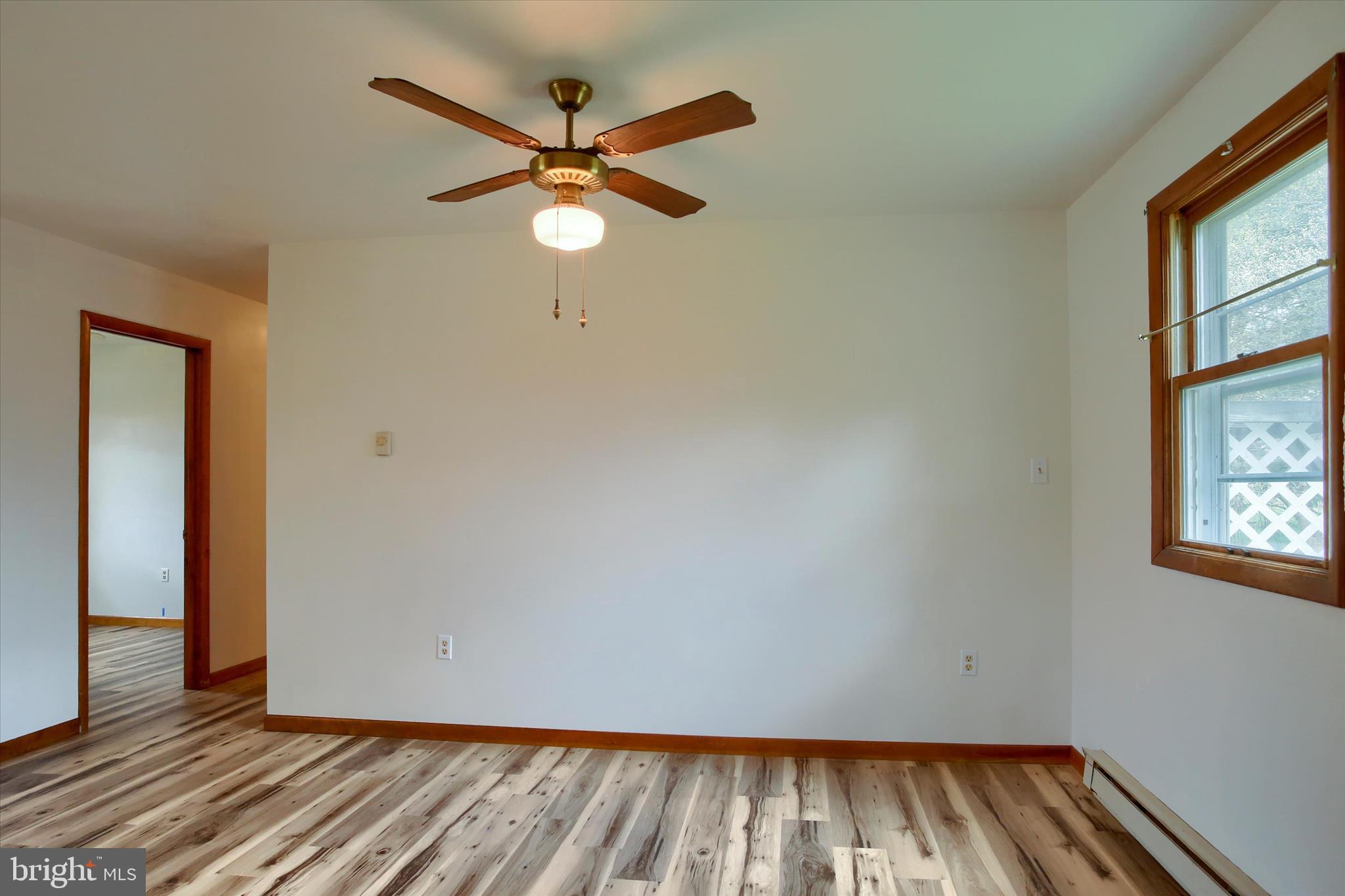 1916 Fisher Road Mechanicsburg, PA 17055 - Photo 11 of 31 a view of room with wooden floor and fan