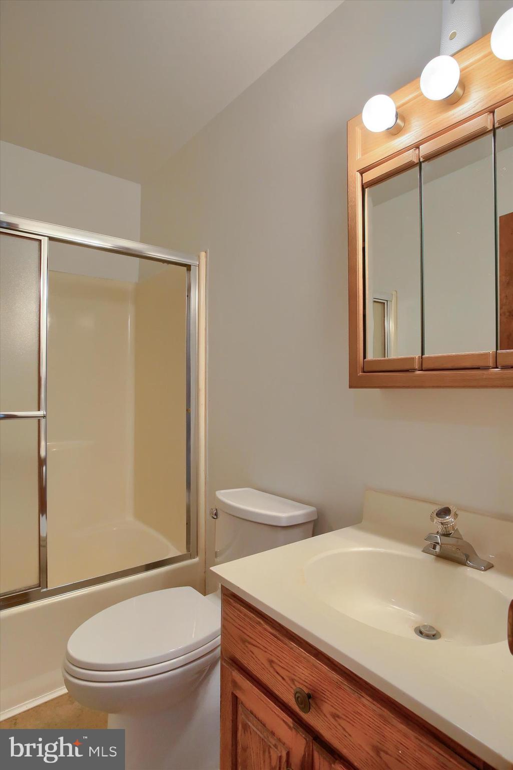 1916 Fisher Road Mechanicsburg, PA 17055 - Photo 18 of 31 a bathroom with a sink a toilet and shower