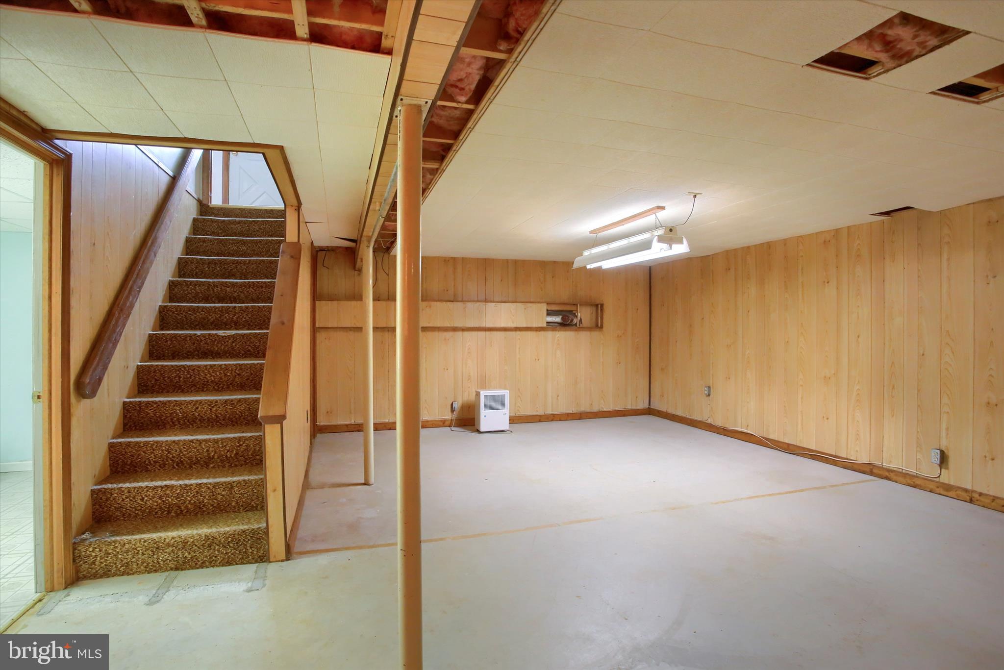 1916 Fisher Road Mechanicsburg, PA 17055 - Photo 21 of 31 a view of an empty room with stairs