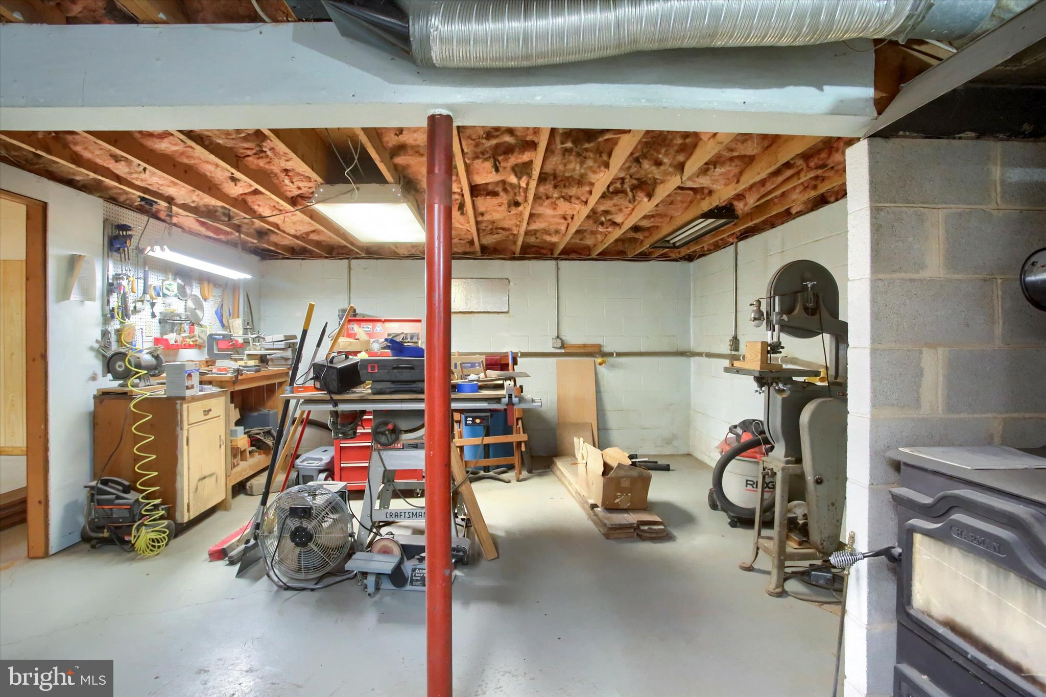 1916 Fisher Road Mechanicsburg, PA 17055 - Photo 24 of 31 a storage and utility room with gym equipment