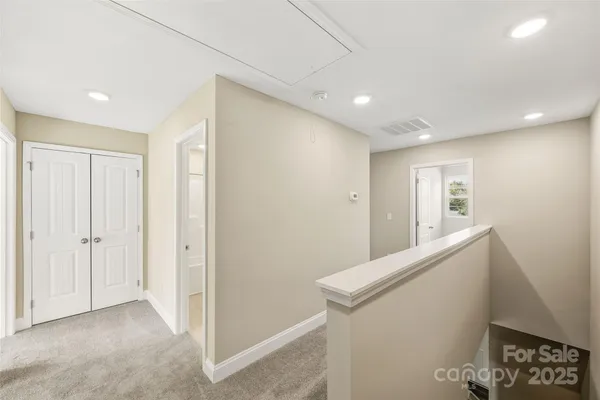 a view of hallway with stairs