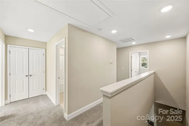 a view of hallway with stairs