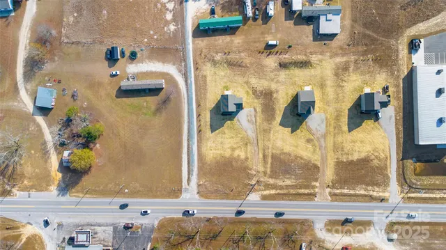 a view of living room with furniture and floor to ceiling window